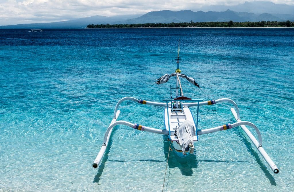 The picture shows a traditional Indonesian fishing boat on Gili Meno.